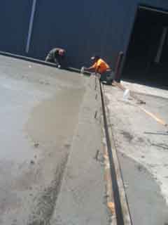 Finishing concrete for large cooler 2