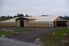 Large horse barn with custom slider doors