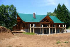 Loc- Seam roof on large 10,000 sq. ft. log cabin